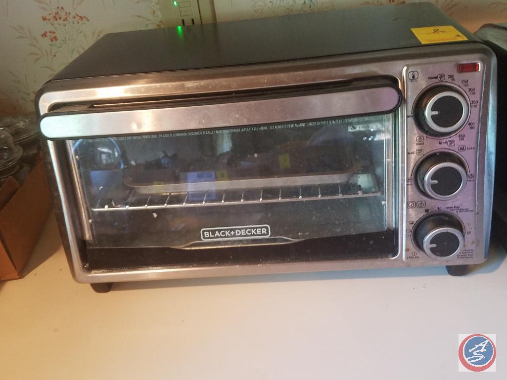 Mainstays microwave oven (model #EM720CGA-W), Hamilton Beach toaster (model #22790), Black and