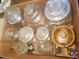 (2) Flats containing an assortment of glass jars with lids, ceramic jar with lid, salt and pepper