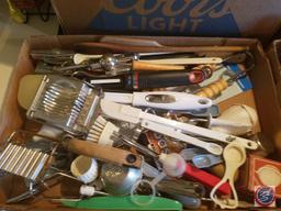 (2) Flats containing assorted kitchen utensils (i.e. spatulas, slicer, wood spoons, measuring