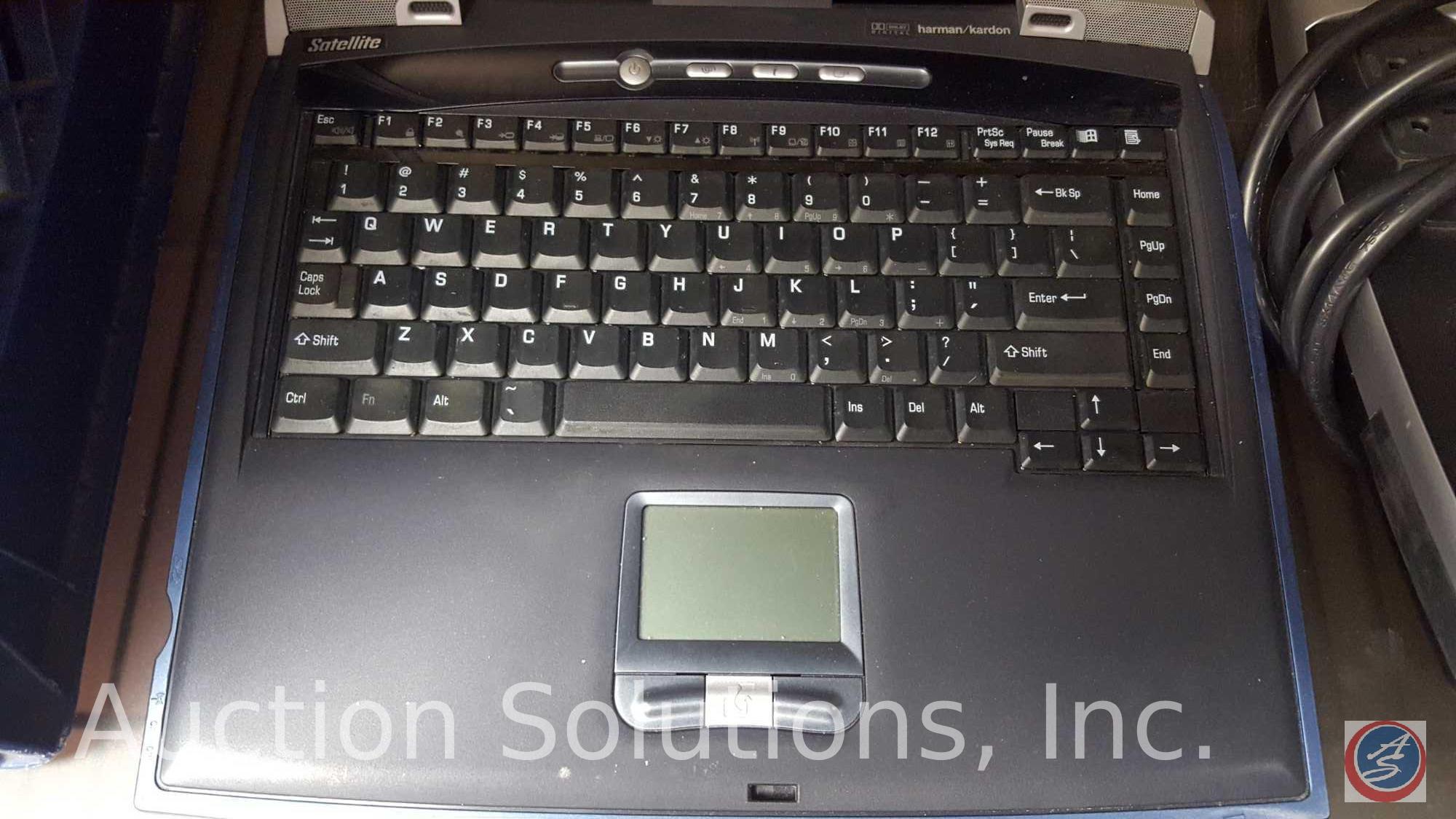 Toshiba Laptop Serial #X2064324P w/ Windows XP, Surge Protector