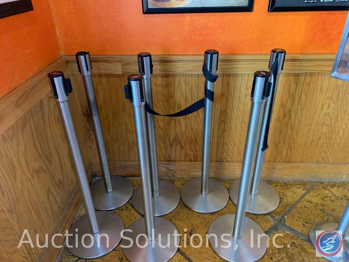 (7) Tensabarrier Stanchions and a Free Standing Sign Holder