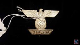 German WWII 1st Class Clasp to the Iron Cross. The front shows a German eagle clutching a swastika