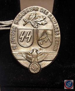 German WWII Waffen SS / SA Gautag Berlin Badge. Measures 1 3/8 wide by 1 3/4" tall. The front shows