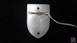 German WWII Waffen SS 1934 Wintertag Badge. Measures 2 3/16? wide by 3 3/16? tall. The front shows a