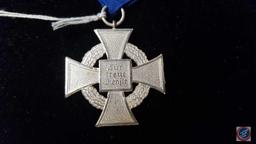 German WWII Political NSDAP 25 Year Faithful Service Cross. The front shows a black enameled