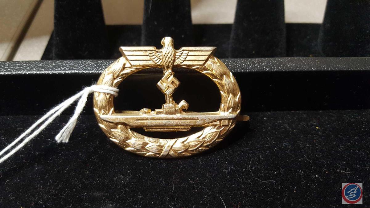 German WWII Naval Kriegsmarine U-Boat Submarine Badge. The front shows the profile of a German