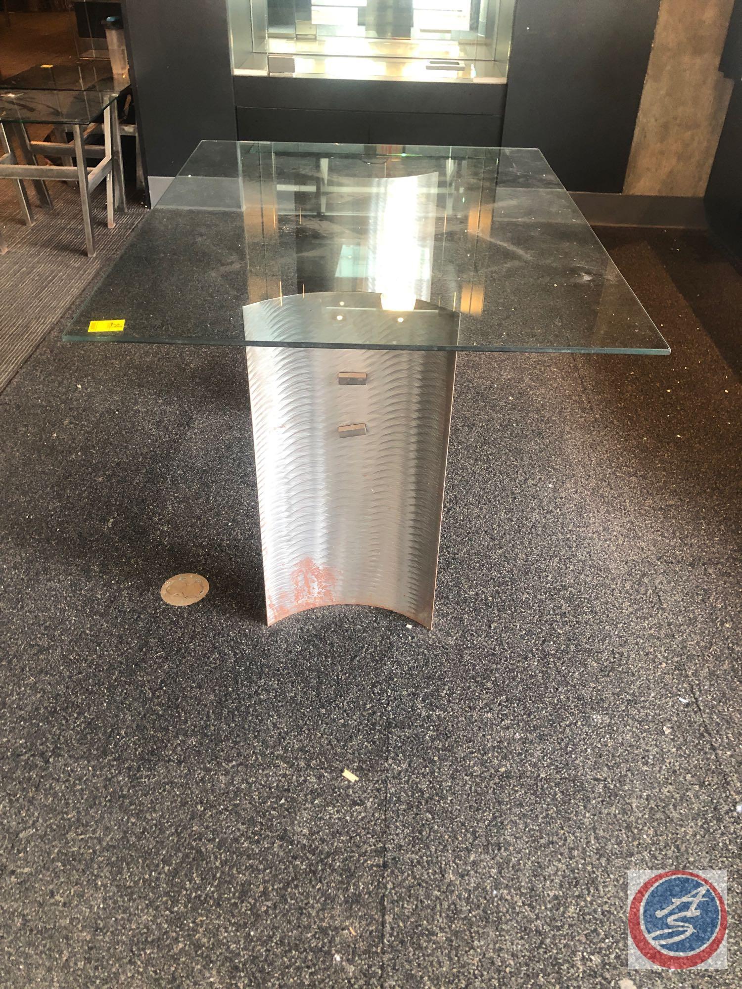 Glass and Metal Table Measuring 48" X 36" X 29 1/2"