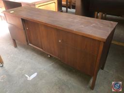Antique / vintage wood credenza with two drawers on the left, two drawers on the right, and two