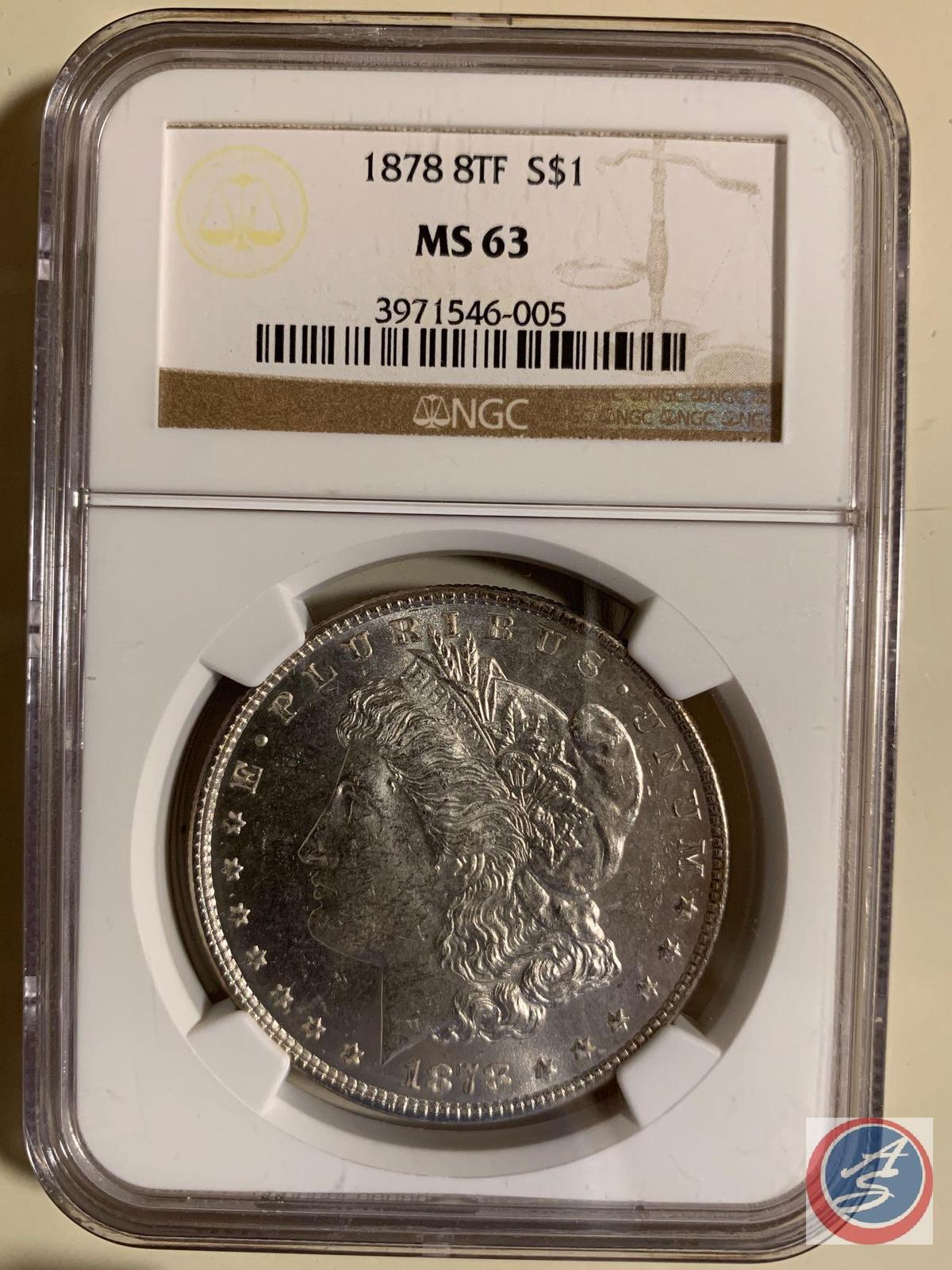 Silver Dollar 1878 NCG slabbed and graded MS 63