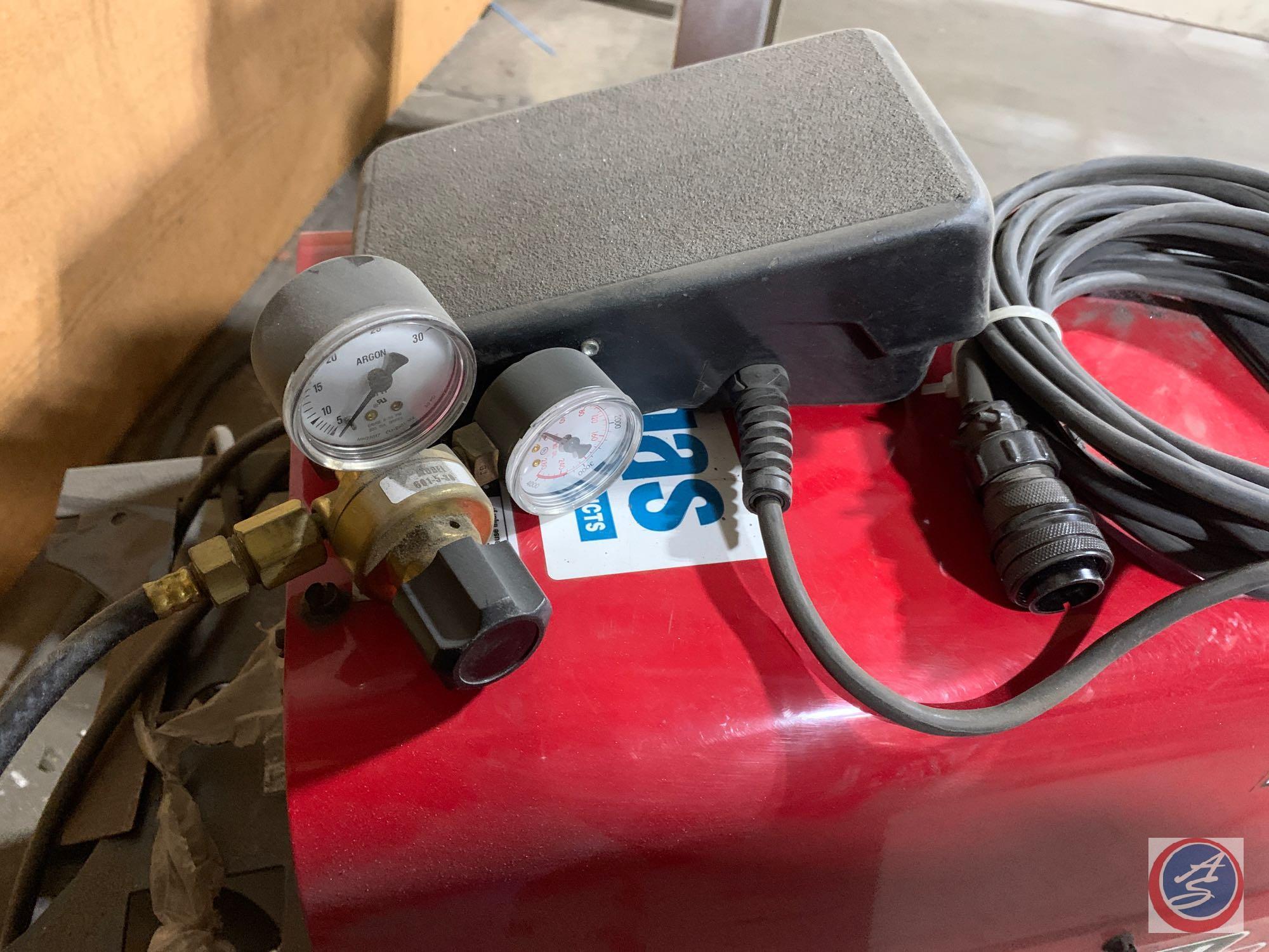 Lincoln Electric Precision TIG 225 TIG welder with assorted electrodes.