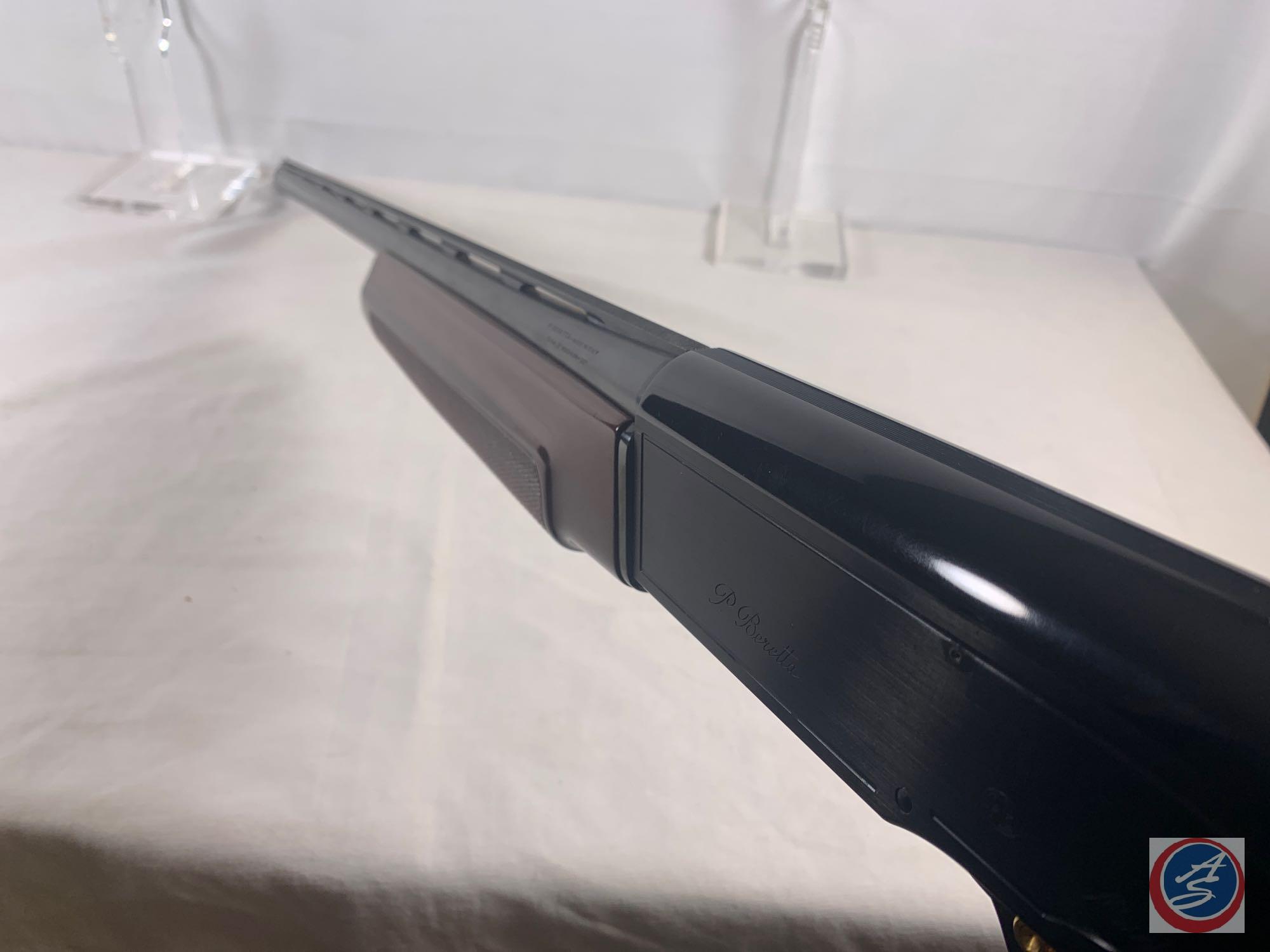 P. Beretta Model A 303 12 GA 3" Shotgun Semi-Auto Shotgun with 28 inch vent rib barrel as new. Ser #