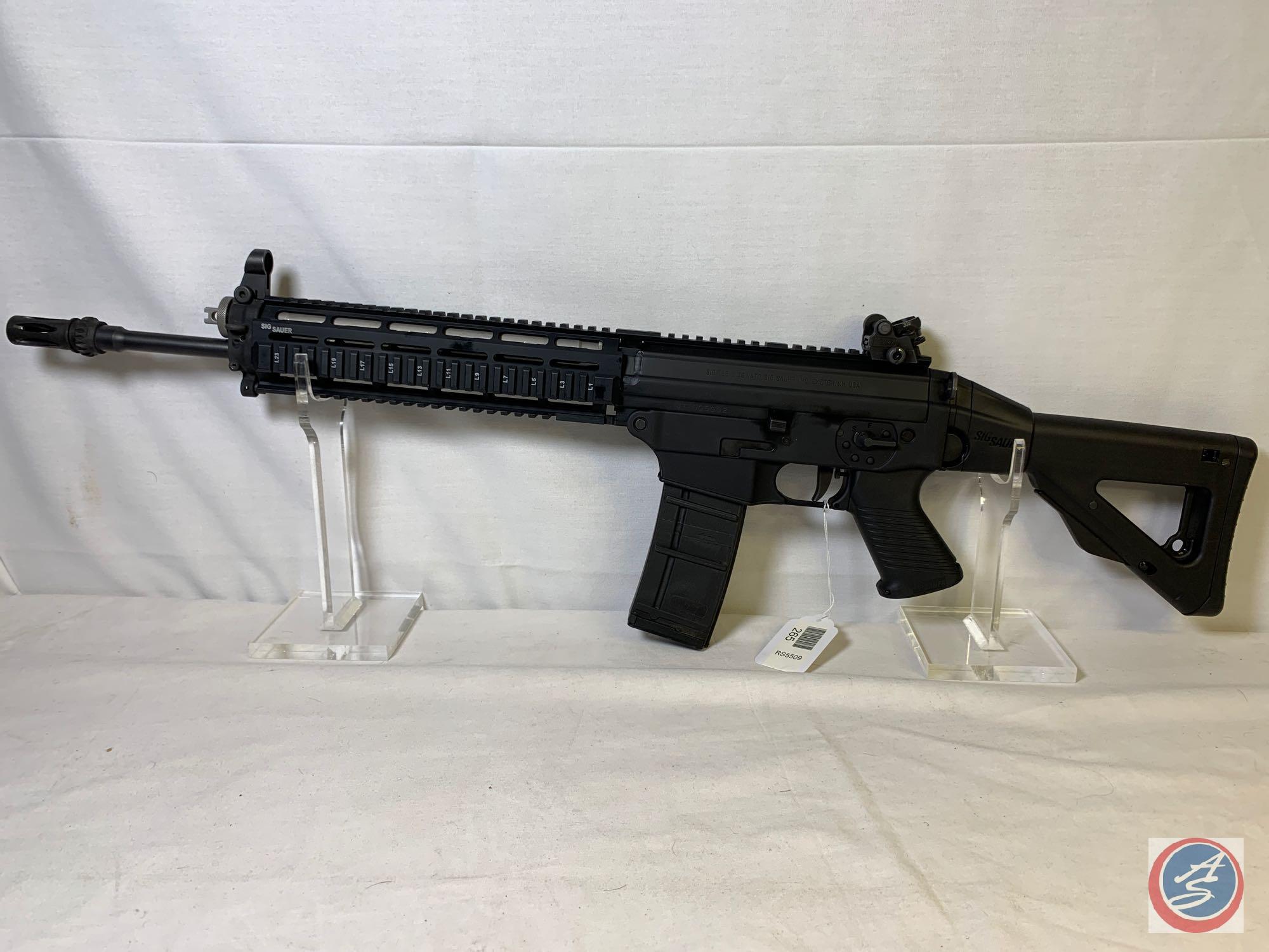 Sig Sauer model Sig556 556 Rifle Semi Auto Rifle with folding stock factory rotary diopter sight, 2