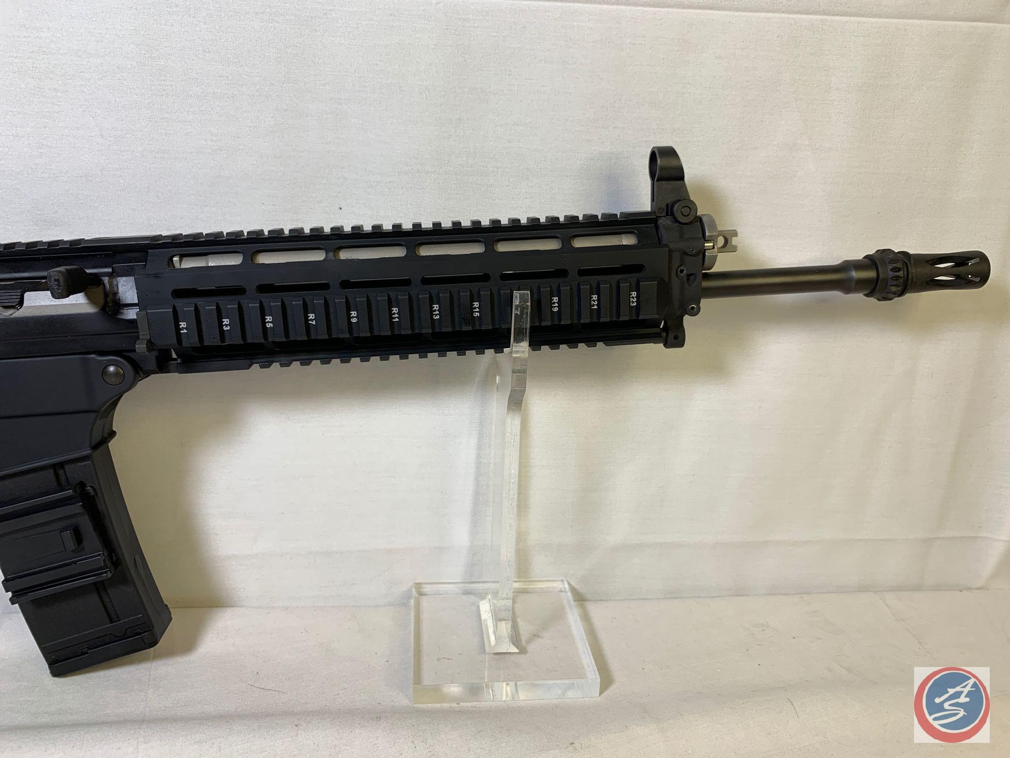 Sig Sauer model Sig556 556 Rifle Semi Auto Rifle with folding stock factory rotary diopter sight, 2