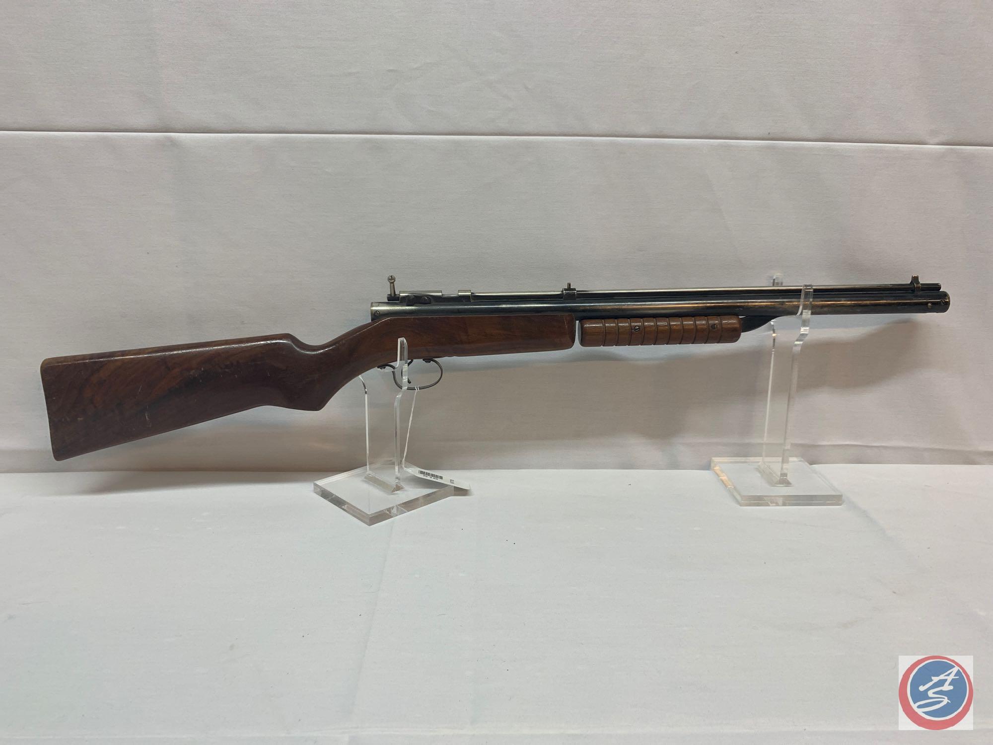 Benjamin Franklin Model Pump... 177 Other Vintage pump air rifle with wooden stock and forearm grip.