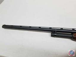 Winchester Model 12 Shotgun 12 GA Pump Action Shotgun with checkered stocks and 30 inch vent rib