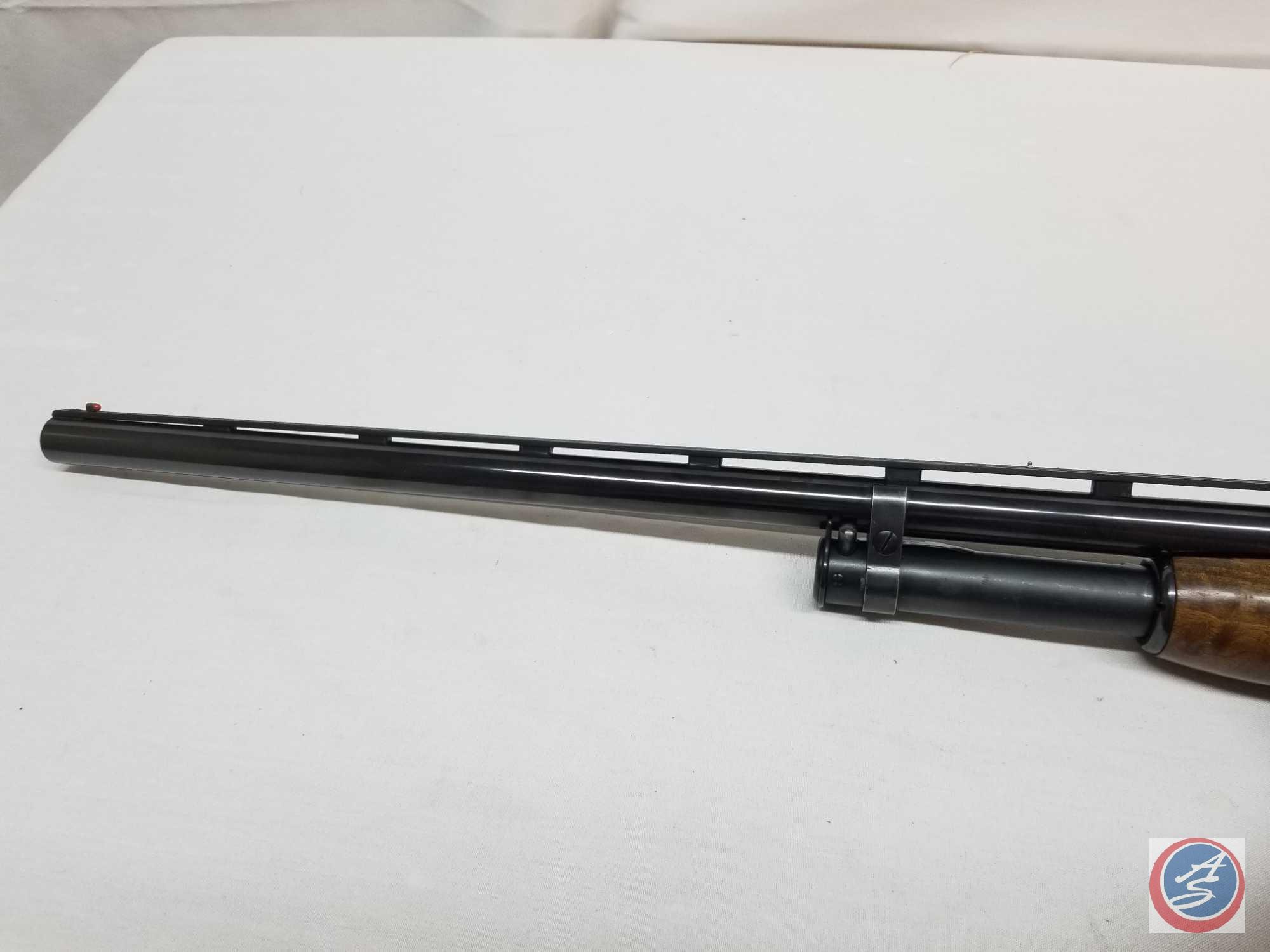 Winchester Model 12 Shotgun 12 GA Pump Action trap grade Shotgun with checkered stocks and 30 inch