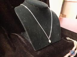 silver-tone necklace and small silver necklace