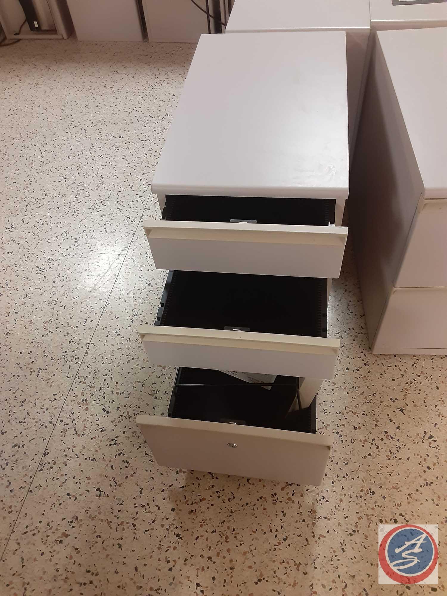 (1) Two Drawer Filing Cabinets and (3) Three Drawer Filing Cabinets Measuring 16 1/2'' X 27 1/2'' X