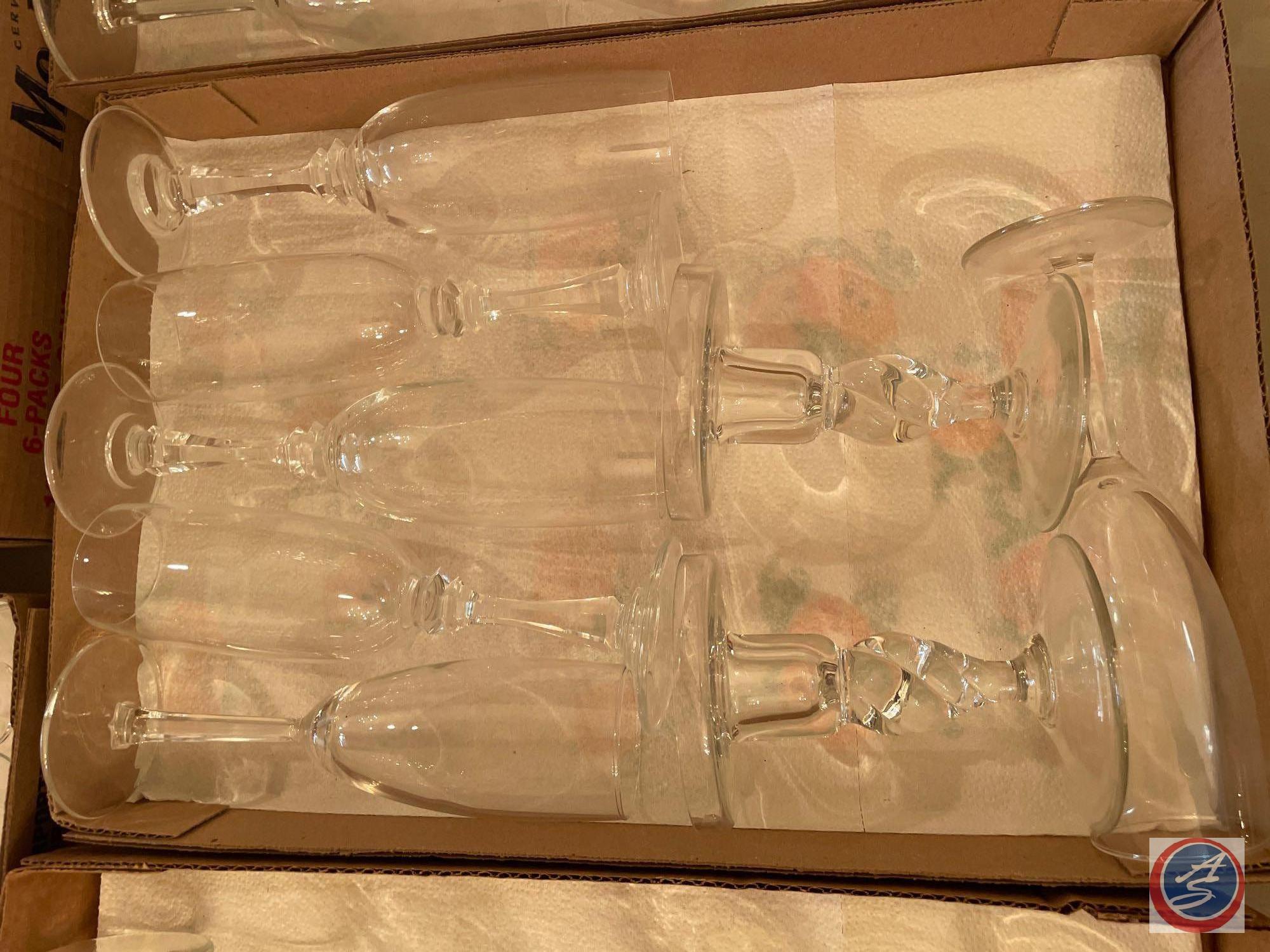 (2) Clear Glass Candlesticks and Assorted Clear Glass Footed Wine Glasses and Champagne Flutes