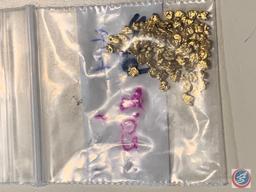 Bag weighing 0.10oz... loose gold nuggets