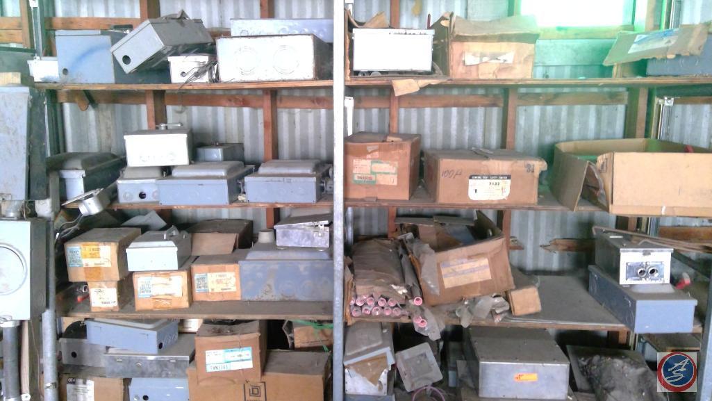 (1) 10x14 shelving unit All One Money electrical boxes, assorted electrical components