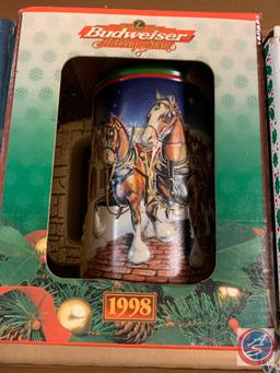 (3) bud steins; 1993 special delivery holiday stein, 1998 holiday stein, Holiday 2007.