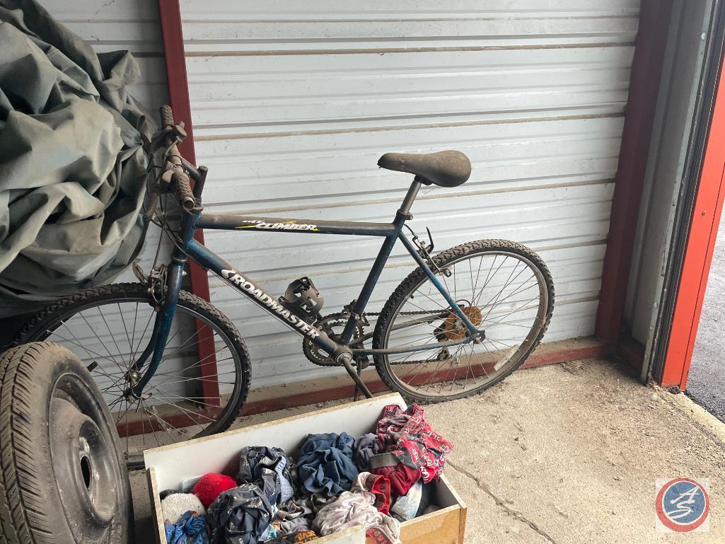 Contents of storage unit 305: Boxes of assorted household item, car tires and rims, Roadmaster