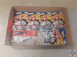 (5) Hot Wheels Snap-On Cars, (1) Key Chain, (1) snap-on screw driver, (1) ruler.