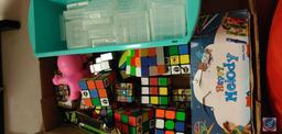 (1) Flat of assorted Rubiks Cubes, Luminous Pens, (1) bag of assorted wood pieces, (1) Plastic