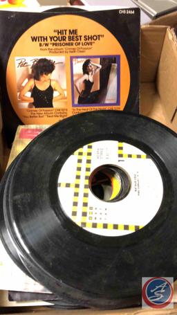 Box of 45 and 33rpm assorted vinyl records, Memorex am/fm cd player model mtt3200