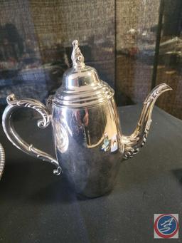 (1) Sliver Tea Pot by WM A Rogers , (3) Sheridan...Silver plated platters , (1) Snuggling rabbits