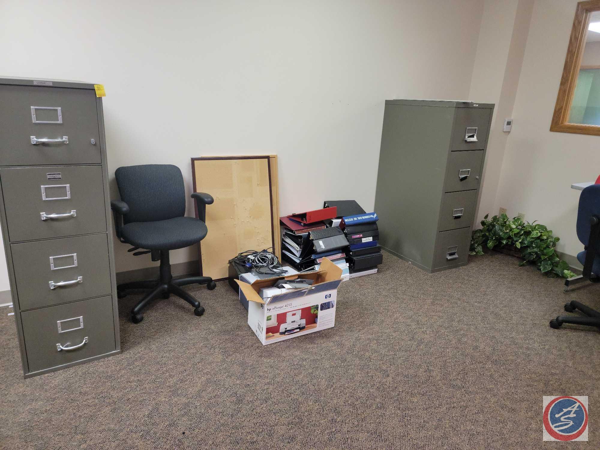 (2) 4 drawer metal file cabinets, 4 stacks of large binders, 2 cork boards, 3 HP printers and cloth