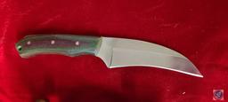 A Tourne'...Knife with a short curved blade. They're also referred to as "birds beak" knives, but a