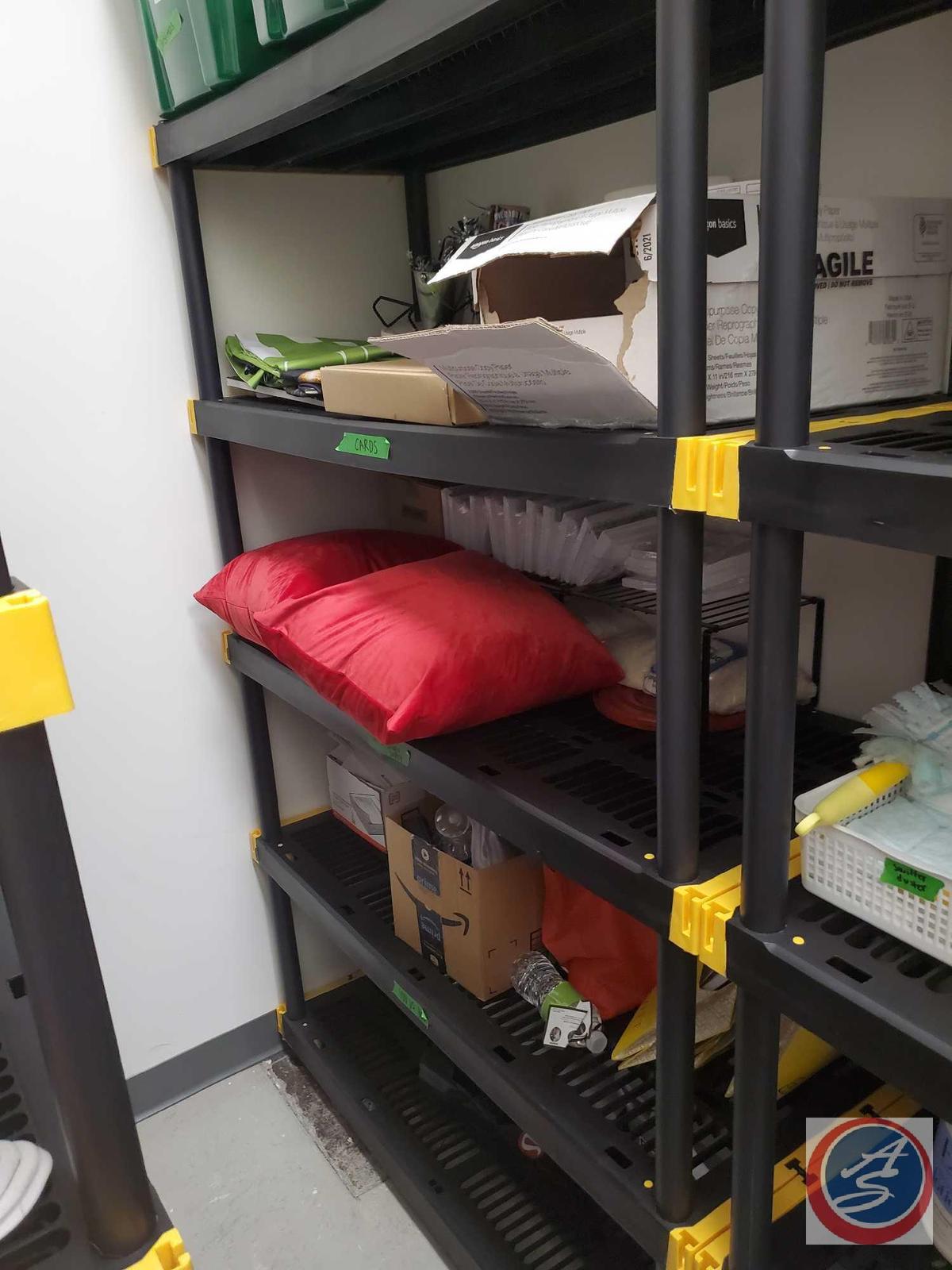 Black and yellow resin shelving. There are 5 shelves and there appears to be anchor points on each