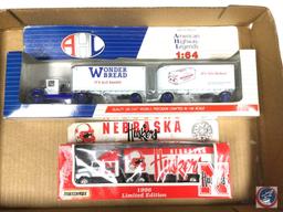 (1) Matchbox Nebraska Husker 96 Delivery Tractor/Trailer, (1) AHL Wonder Bread Tractor/Trailer w/Pup