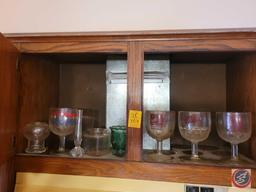 Assortment of beer advertisement glasses, brands include Schlitz, Falstaff, and Hamms. Also included