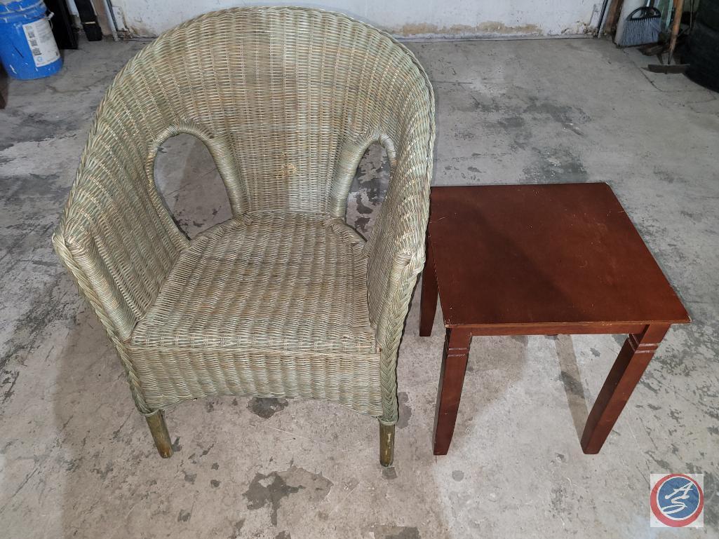 small corner table and wicker chair