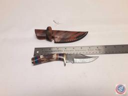 Hand Made Damascus Steel Knives with custom wood, bone, horn or resin handles. The Knives are made