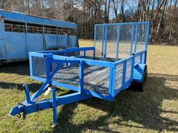 10ft. Single axle metal trailer with rails and ramp