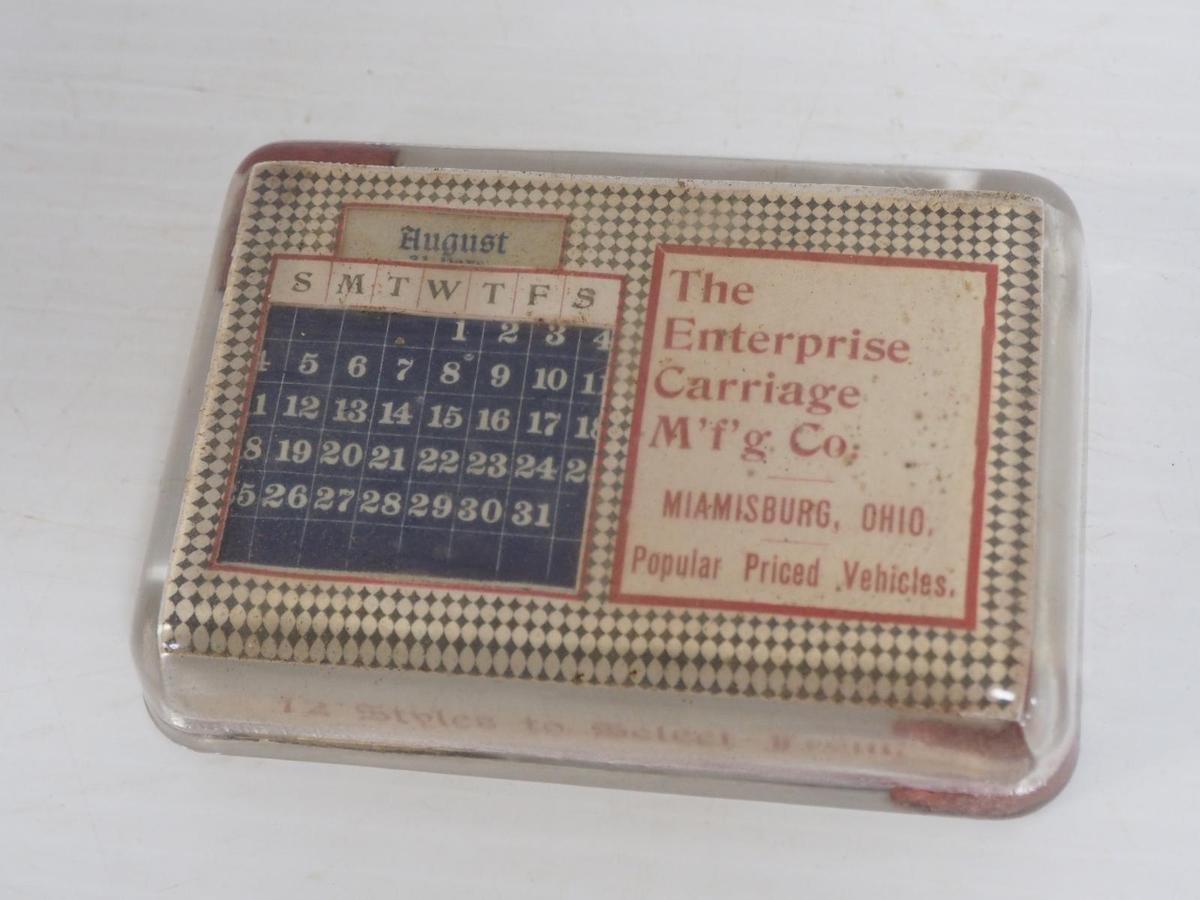 Early glass-encased desktop calendar