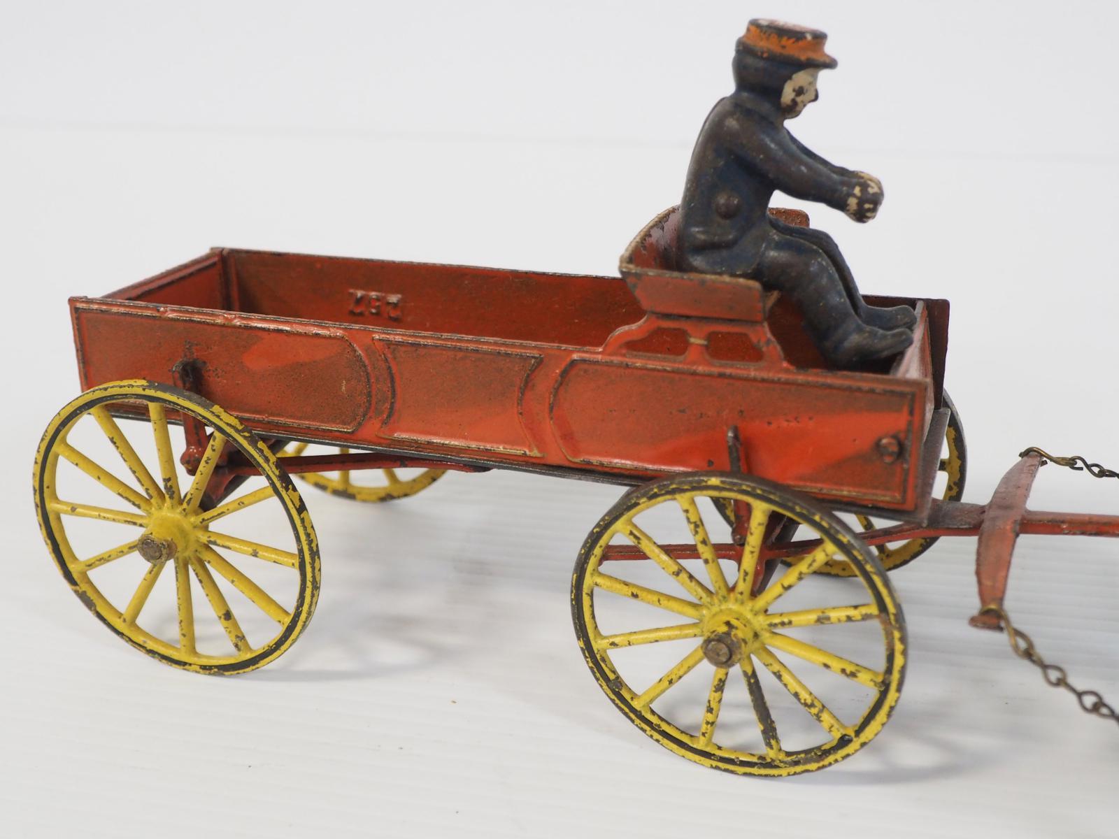 Wilkins red buckboard wagon