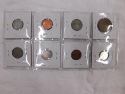 8 FOREIGN COINS