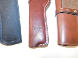 (3) PISTOL HOLSTERS - 2 LEATHER & 1 CANVAS