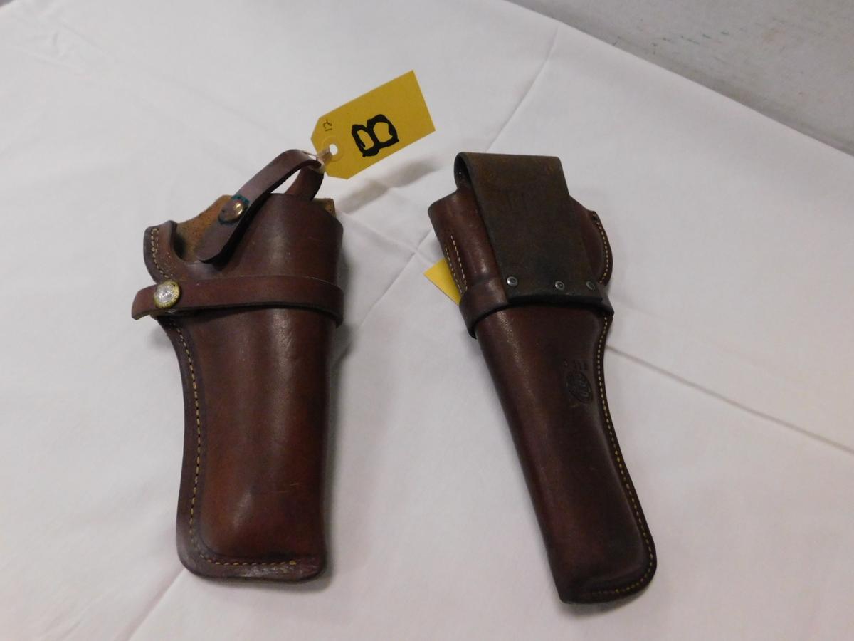 (2) LEATHER PISTOL HOLSTERS - BUCHEIMER & HH HEISER