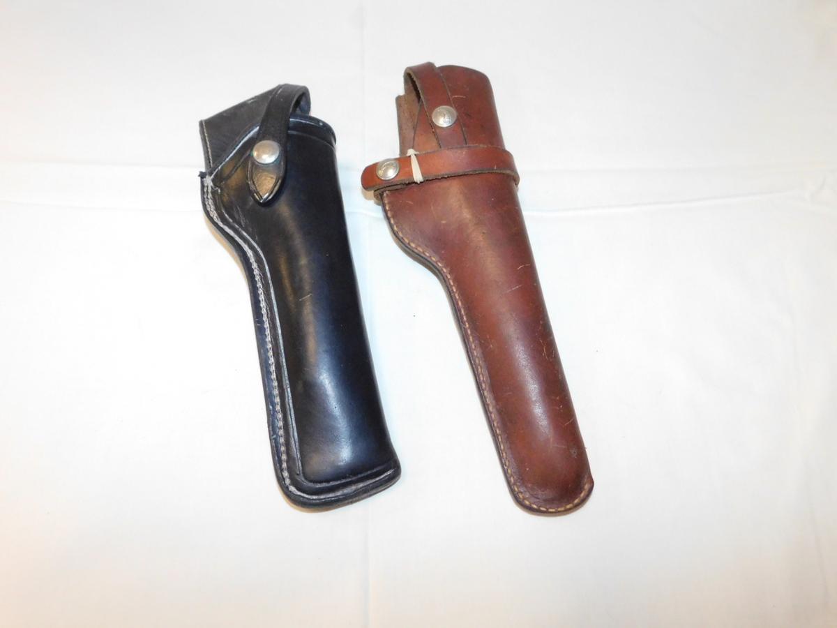 (2) LEATHER PISTOL HOLSTERS