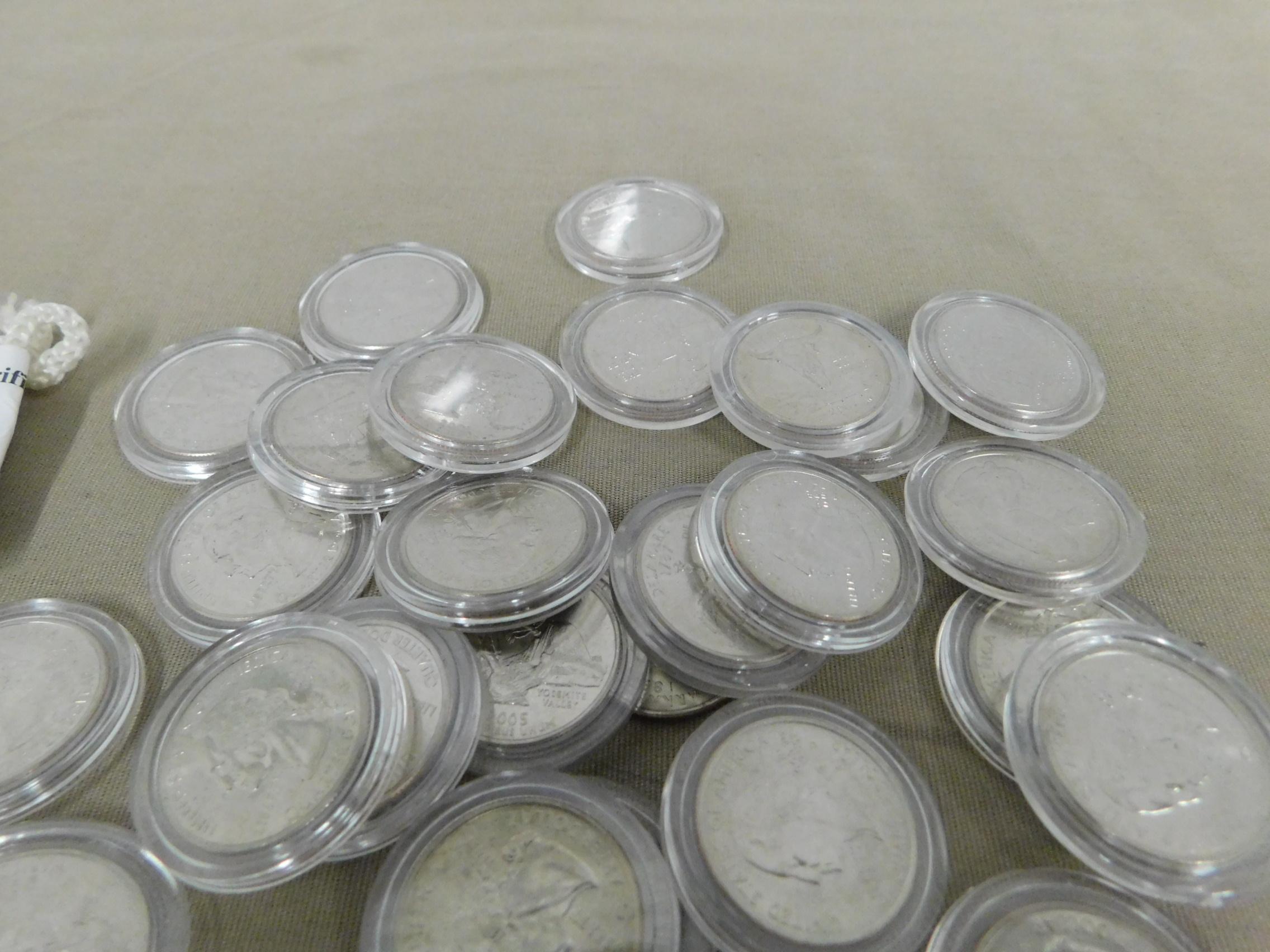 BAG OF 37 UNPLATED STATE QUARTERS