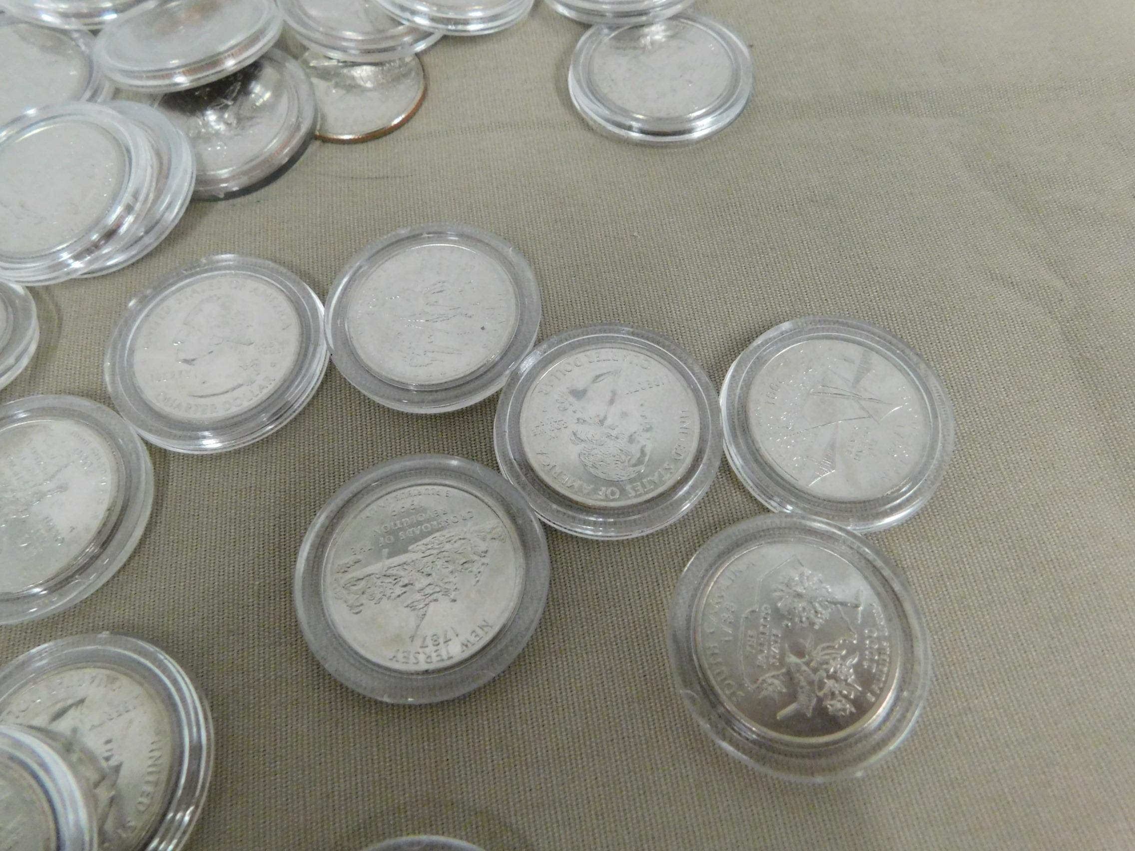 BAG OF 37 UNPLATED STATE QUARTERS