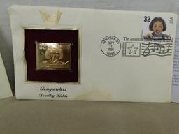 (2) FIRST ISSUE22 KT  GOLD STAMPS