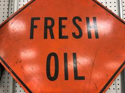 FRESH OIL ROAD SIGN