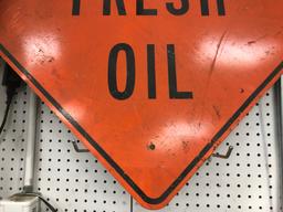 FRESH OIL ROAD SIGN